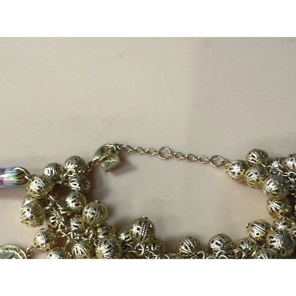 Gold Tone Boho Charm Bracelet with Coins‎ Tassels and Filigree Beads Multi Color